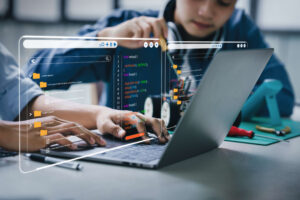 Financial planning and RPA In finance. people sitting at at computer sharing screen.