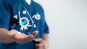 Medical person holding technology badge