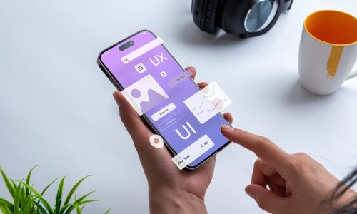 Process of creating an interface for a mobile app. User interface and experience concept. Modern app on smart phone in woman hands Process of creating an interface for a mobile app. User interface and experience concept. Modern app on smart phone in woman hands
